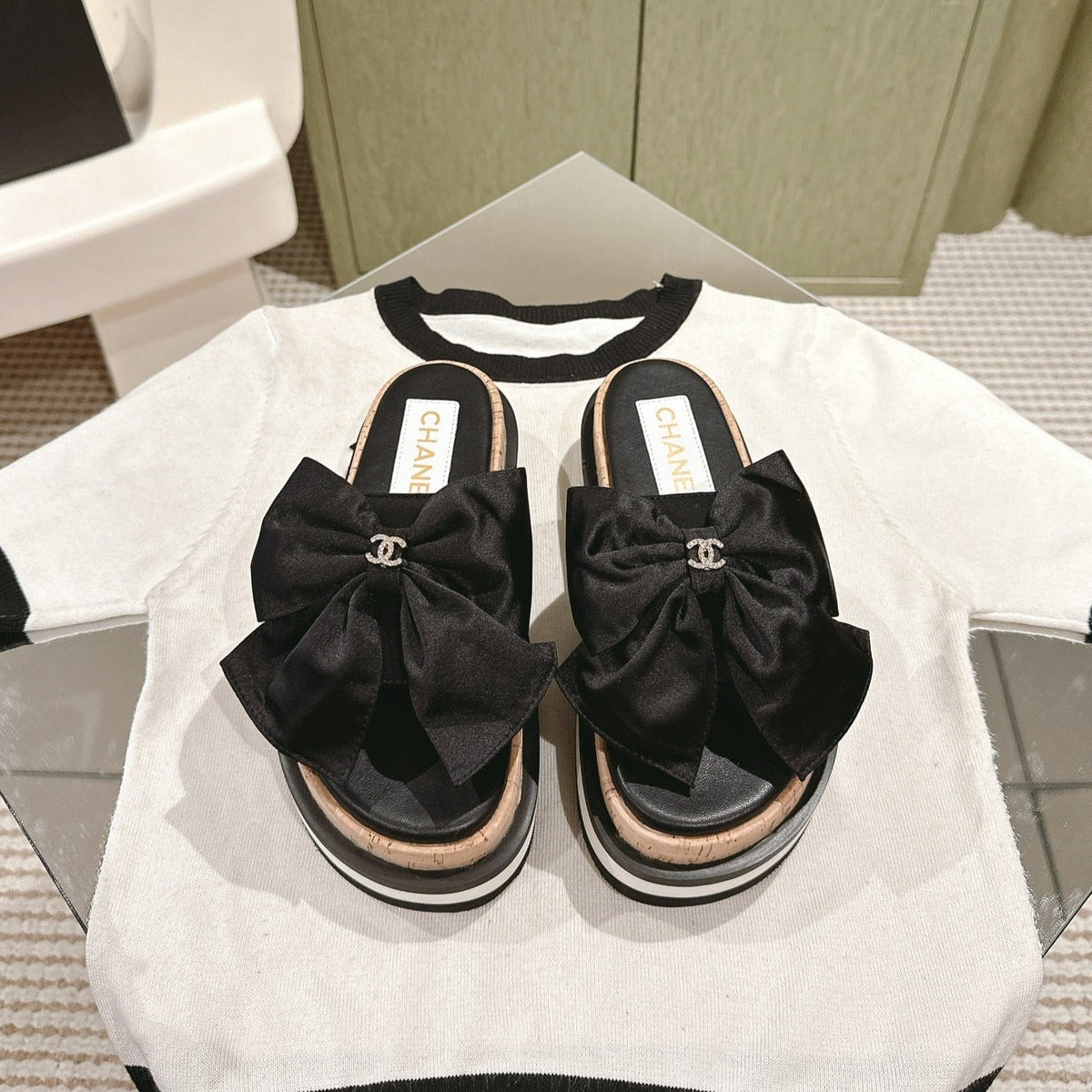 CHANEL SLIPPERS WITH SILK BOW IN BLACK COWHIDE