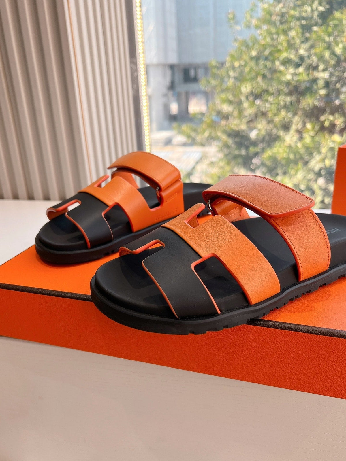 HERMES CHYPRE SANDAL IN VIVID ORANGE MIX BLACK CALFSKIN
