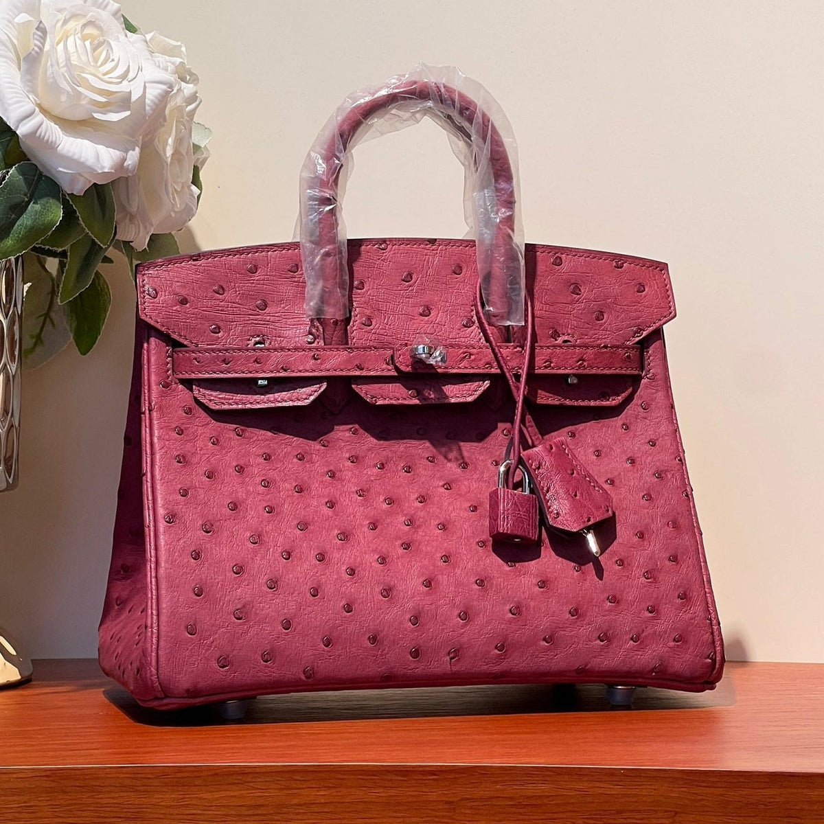 HERMES KELLY SELLIER 25 BAG IN CURRANT RED OSTRICH LEATHER WITH SILVER HARDWARE